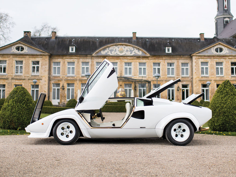 Illustration for article titled I Am Morally Offended By This Gold-Plated Lamborghini Countach Interior